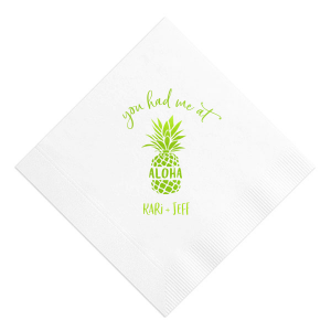 Capture the magic of love with the You had Me at Aloha Napkin. Featuring a charming pineapple graphic with "Aloha" banded across it, this design gives a playful twist to a classic romantic movie line. Perfect for couples who want to add a touch of Hawaiian charm to their special day.