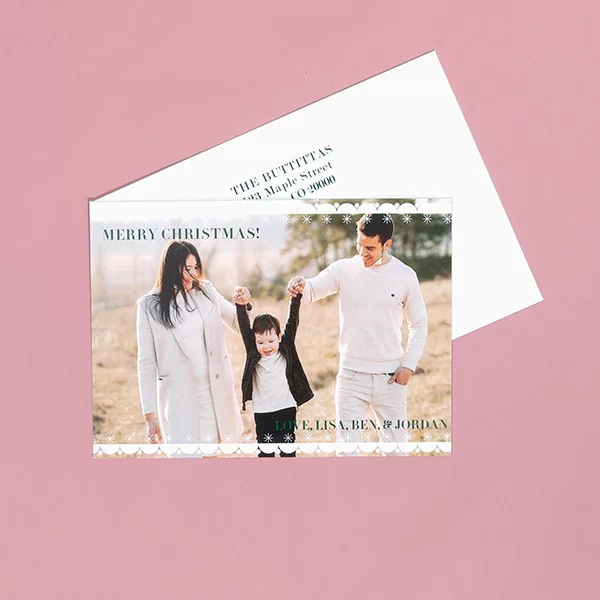 Printed Holiday card on a pink background