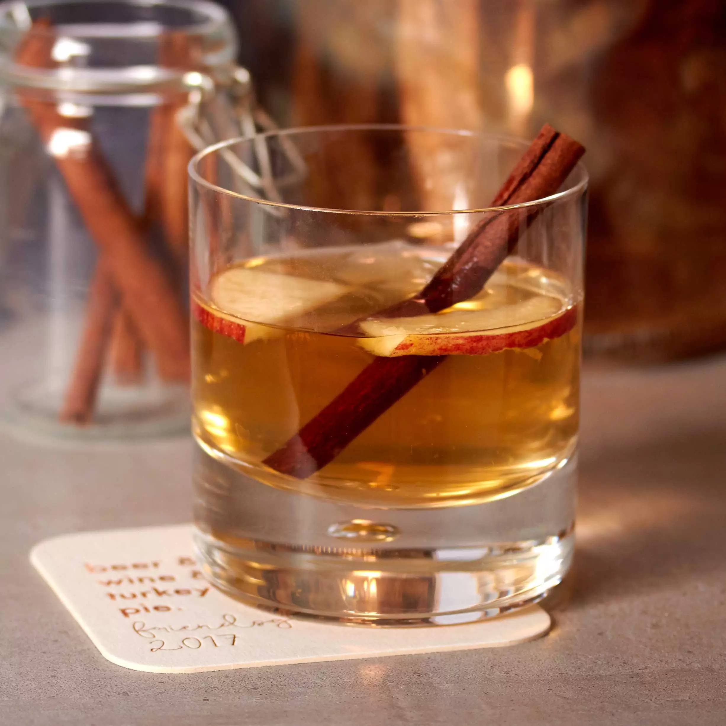 whiskey cocktail with custom coaster