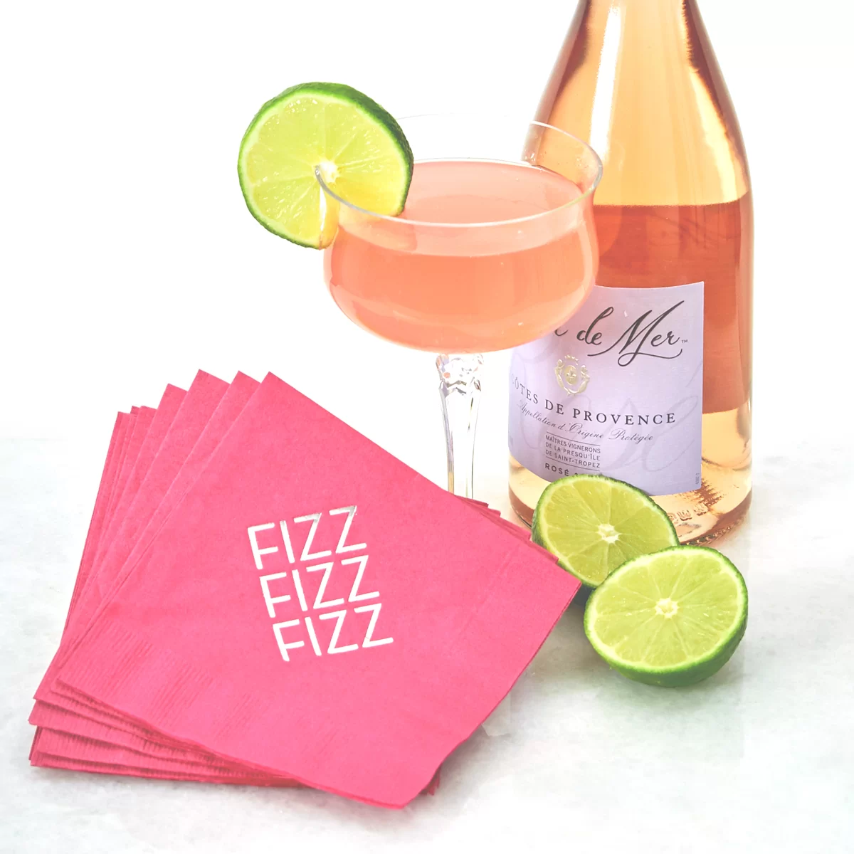 Rosè Cosmo cocktail recipe with personalized cocktail napkin