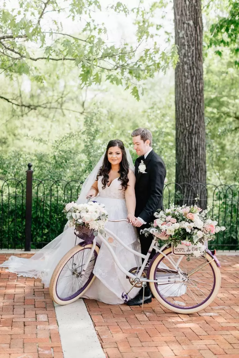 Bride and groom with vintage bike wedding photography inspiration