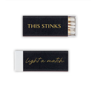 Add a humorous touch to practicality with our This Stinks Match. With a bold statement on the front, it brings a light-hearted approach to an age-old courtesy. The back gently prompts "Light a Match" in elegant cursive. Ideal for events, these matches offer a witty solution for bathroom etiquette.