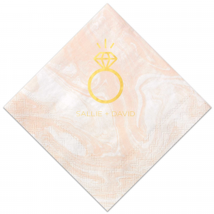 Celebrate the sparkle of love with the Diamond Ring Napkin. This design features a striking modern illustration of a solitaire diamond ring, complete with dazzling sparks. Below, the couple's names in bold all-caps lettering underscore the excitement of their engagement, making this napkin a brilliant tribute to their commitment.
