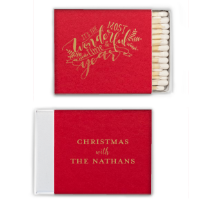 Light up your holiday gatherings with the The Most Wonderful Time Holiday Matchbox, featuring a chorus of festive fonts and evergreen boughs. 'Wonderful' takes center stage, with room to add your family name, sparking joy in every flicker.