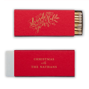 Light up your holiday gatherings with the The Most Wonderful Time Holiday Matchbox, featuring a chorus of festive fonts and evergreen boughs. 'Wonderful' takes center stage, with room to add your family name, sparking joy in every flicker.