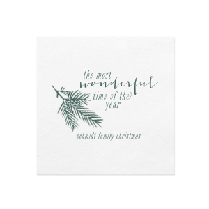 Embrace the holiday spirit with the Pine Christmas Family Name Napkin, where 'the most wonderful time of the year' unfurls beside a festive pine branch. Personalized with your family name, this napkin wraps each celebration in nostalgic cheer.