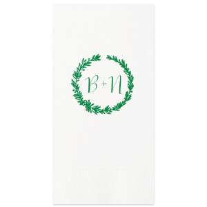 The Botanic Wreath Monogram Napkin pairs rustic charm with personalized elegance, showcasing a verdant wreath that frames your initials. This design lends a touch of natural sophistication to any event, making it an ideal choice for those seeking a blend of the classic and the personal.