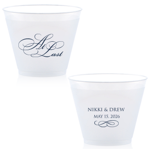 The At Last Cup features elegant calligraphy reading “At Last” reversed with the couple's names and a graceful flourish for a timeless drinkware detail. Use it to elevate your celebration with a romantic touch. Refined for wedding receptions and sentimental keepsakes.