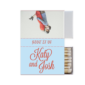 Capture love’s spark with the Love Snapshot Photo Matchbox. It features the couple’s names in a fun, flirty script on the front. The back displays a playful photo of the couple, radiating their shared joy. The celebration date adorns the side, making this matchbox a memorable keepsake of their special day. This design invites couples to choose a beloved photo to personalize their own matchbox, adding a unique and intimate touch to their wedding celebration.