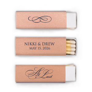 The At Last Matches features elegant calligraphy reading “At Last” reversed with the couple's names and a graceful flourish for a timeless presentation. Use it to elevate your celebration with a refined, romantic touch. Refined for wedding receptions and sentimental keepsakes.