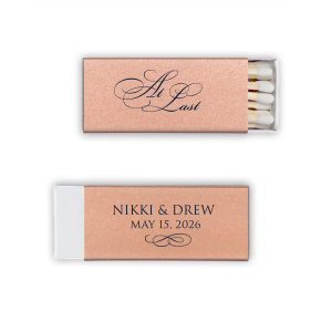 The At Last Matches features elegant calligraphy reading “At Last” reversed with the couple's names and a graceful flourish for a timeless presentation. Use it to elevate your celebration with a refined, romantic touch. Refined for wedding receptions and sentimental keepsakes.