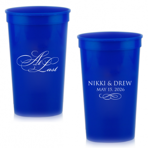 The At Last Couples Cup features elegant calligraphy reading “At Last” reversed with the couple's names and a graceful flourish for a timeless drinkware detail. Use it to elevate your celebration with a romantic touch. Refined for wedding receptions and sentimental keepsakes.