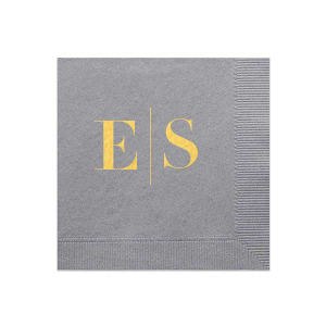 The Modern Serif Initials Napkin features bold serif initials separated by a clean vertical line for a modern, tailored look. Add it to elevate place settings with understated sophistication. Refined for weddings and cocktail hours.