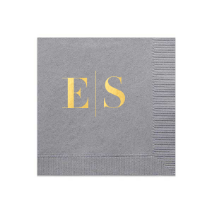 The Modern Serif Initials Napkin features bold serif initials separated by a clean vertical line for a modern, tailored look. Add it to elevate place settings with understated sophistication. Refined for weddings and cocktail hours.