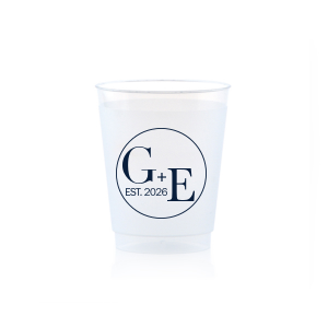 The Contemporary Initials Badge Cup features balanced typography of the couple’s initials and establishing year framed within a clean, round emblem for a timeless drinkware detail. Use it to serve beverages with a polished, personalized feel guests will appreciate. Perfect for weddings and celebratory toasts!