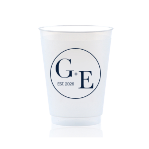The Contemporary Initials Badge Cup features balanced typography of the couple’s initials and establishing year framed within a clean, round emblem for a timeless drinkware detail. Use it to serve beverages with a polished, personalized feel guests will appreciate. Perfect for weddings and celebratory toasts!