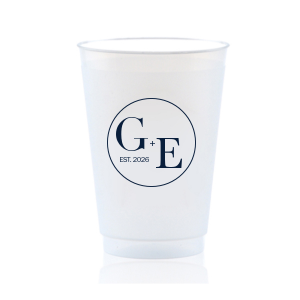The Contemporary Initials Badge Cup features balanced typography of the couple’s initials and establishing year framed within a clean, round emblem for a timeless drinkware detail. Use it to serve beverages with a polished, personalized feel guests will appreciate. Perfect for weddings and celebratory toasts!