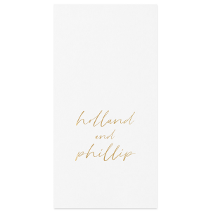 The Golden Names Napkin features elegant handwritten-style lettering of the couple's names with a clean, minimalist layout for a timeless look. Add it to your celebration to create a refined tablescape that feels thoughtful and cohesive. Lovely for wedding receptions or engagement parties!