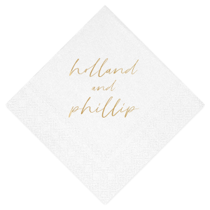 The Golden Names Napkin features elegant handwritten-style lettering of the couple's names with a clean, minimalist layout for a timeless look. Add it to your celebration to create a refined tablescape that feels thoughtful and cohesive. Lovely for wedding receptions or engagement parties!