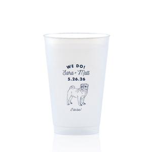 The We Do, I Do Too Cup features the phrase “We Do!” and “I Do Too!” along with the couple’s special name and date in playful script, accompanied by a hand-drawn dog illustration. Choose this cup to add personality guests will remember and reuse. Spot-on for wedding celebrations!