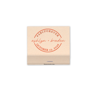 The Eternal Union Matchbox is a chic emblem of unity. Atop, a bold arc features a unifying hashtag blending initials and ‘Forever’, capturing love’s permanence. Centered in the badge, a flowy, lowercase script names the couple, while the arc below seals the design with the event date. This matchbox symbolizes a timeless journey, embracing modern traditions with a hashtag’s playful twist.