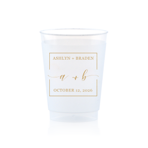 The Square Monogram Frame Cup features elegant script of the couple’s initials, paired with their names and special date within a clean rectangular border for a refined drinkware detail. Use it to elevate beverage service with a polished, personalized touch. Refined for wedding receptions or rehearsal dinners.