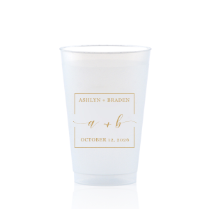 The Square Monogram Frame Cup features elegant script of the couple’s initials, paired with their names and special date within a clean rectangular border for a refined drinkware detail. Use it to elevate beverage service with a polished, personalized touch. Refined for wedding receptions or rehearsal dinners.