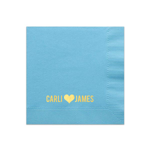 The Heartfelt Names Napkin beautifully expresses love in its simplest form. Featuring the couple's names in bold capitals with a large solid heart symbolizing 'loves' between them, this design evokes youthful declarations of affection, perfectly capturing the essence of their bond in a straightforward, yet poignant manner.