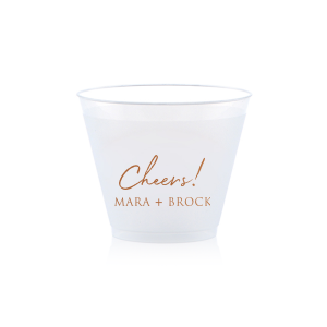 Raise a toast with the Cheers to the Couple Name Cup, where festivity meets elegance. A large, fanciful "Cheers!" in an exuberant script sets the stage for celebration, while the couple's names in bold capitals underscore the personal touch. This frosted cup's simple yet impactful design perfectly encapsulates the spirit of a joyous toast to love and unity.