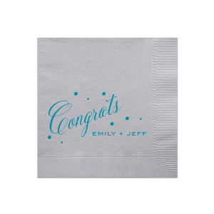 Celebrate special moments with the Small Confetti Dot Congrats Napkin, featuring 'Congrats' in an exuberant, flourished script, accentuated by fluttering dots that amplify its joyful energy. Below, the couple's names in simple block capitals add a grounding contrast, perfectly capturing the spirit of congratulations and celebration.
