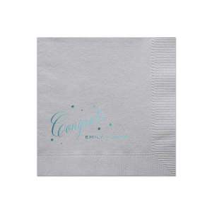 Celebrate special moments with the Small Confetti Dot Congrats Napkin, featuring 'Congrats' in an exuberant, flourished script, accentuated by fluttering dots that amplify its joyful energy. Below, the couple's names in simple block capitals add a grounding contrast, perfectly capturing the spirit of congratulations and celebration.