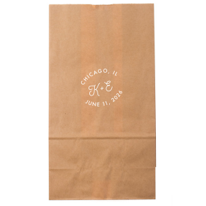 The Bespoke Logo Initials Stamp Wedding Bag design charmingly transforms the couple's initials into a bespoke logo, playfully echoing the sophistication of a stamped seal. Arching the city and date around it adds a personalized flair, turning each piece into a unique hallmark of their special day.