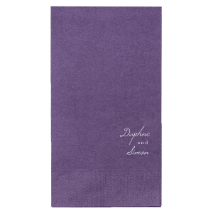 The Romantic Script You and Me Napkin exudes understated sophistication. Positioned in the lower right corner, it features the couple's first names in delicate, stacked script. This design suits a couple who embrace subtlety and elegance, making a quiet yet refined statement about their union, perfect for those who prefer their celebration to be intimate and heartfelt.