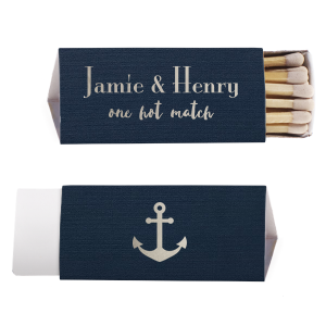 Set sail with the Nautical Pair Matchbox, showcasing the couple's names in elegant font on the front, accompanied by a playful "one hot match" in charming script. The back is adorned with a sea of nautical anchors, lending a maritime feel, perfect for couples celebrating their perfect union.