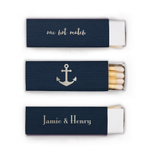 Set sail with the Nautical Pair Matchbox, showcasing the couple's names in elegant font on the front, accompanied by a playful "one hot match" in charming script. The back is adorned with a sea of nautical anchors, lending a maritime feel, perfect for couples celebrating their perfect union.