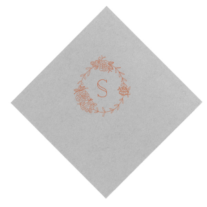 The Peony Frame Monogram Initial Napkin embodies Victorian elegance with its detailed floral arrangement of peonies, symbolizing happiness and prosperity. With the celebrant's initial in the center, this napkin conveys an air of sophistication and natural beauty. 