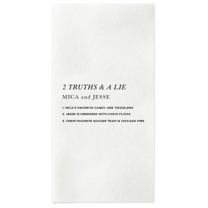 The Two Truths and a Lie Napkin energizes social interaction with its clever design. It features the game's title, the couple's names, and three statements for guests to decipher, blending decor with playful engagement and sparking lively conversations at each table.