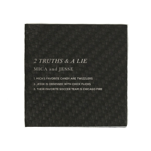 The Two Truths and a Lie Napkin energizes social interaction with its clever design. It features the game's title, the couple's names, and three statements for guests to decipher, blending decor with playful engagement and sparking lively conversations at each table.