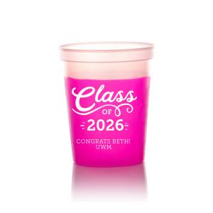 The Swirly Class of Graduation Name Stadium Cup design exudes celebratory energy with its bold "Class Of" declaration. A playful, swirling script for "Class" and an expansive flourish underneath capture the joy of graduation. Congratulatory wishes and school initials below, accented with light beams, amplify the cup's vibrant and spirited design.