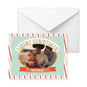 Spread some holiday cheer with this retro inspired Christmas Card! Featuring a cheerful candy cane background, you can customize this Christmas Card with your Family name. 