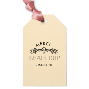 Elevate your gifting experience with our exquisite personalized gift tag, crafted using the timeless art of letterpress printing. This tag embodies elegance with a charming "Merci Beaucoup" message, perfect for expressing gratitude.