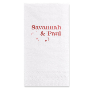 The Retro Wedding Names Napkin features rounded lettering of the couple's names paired with twinkling star accents for a celebratory look. Set it out to add warmth and personality to your table setting. Just right for engagement parties or weddings!