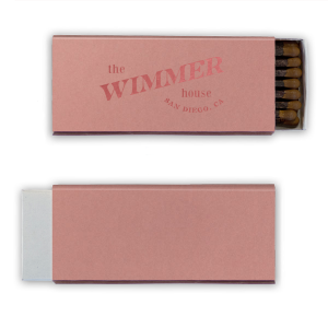 The Vintage Family Name House Matchbook features slanted lettering, and a stamped emblem for a timeless look. Add it to spark ambiance and elevate everyday moments effortlessly. Works great for summer gatherings or relaxed dinner parties.