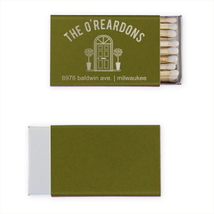 The Family Front Door Matches features a welcoming doorway sketch, charming potted accents, and arched typography with customizable name, address, and city. Add it to your entry table to create a warm first impression that guests remember. Ideal for housewarmings and new-home celebrations!