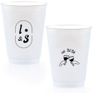 The Sunburst Initial & Toasting Glass Cup features an oval frame with classic initials, a subtle star accent, and a toast illustration with the date on the reverse. Order yours to serve drinks with a chic, custom feel guests will love. Fitting for weddings and engagement parties!