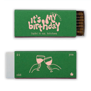The It's My Birthday Cheers Matches features oversized bubbly lettering paired with irreverent celebratory phrases, clinking glasses, and playful numeric text that leans loud and confident. Choose it to lighten the party mood and invite guests to “light it up” too. Just right for milestone birthdays.