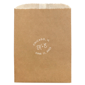 The Bespoke Logo Initials Stamp Wedding Bag design charmingly transforms the couple's initials into a bespoke logo, playfully echoing the sophistication of a stamped seal. Arching the city and date around it adds a personalized flair, turning each piece into a unique hallmark of their special day.