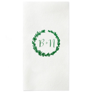 The Botanic Wreath Monogram Napkin pairs rustic charm with personalized elegance, showcasing a verdant wreath that frames your initials. This design lends a touch of natural sophistication to any event, making it an ideal choice for those seeking a blend of the classic and the personal.