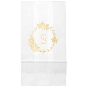 The Romantic Peony Frame Monogram Bag elegantly captures the essence of joy and romance. A wreath of lush peonies and greenery forms a delicate frame, encircling the celebrant's initial in a graceful display. This design exudes elegance, symbolizing happiness, prosperity, and a blissful union.
