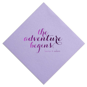 The Elegant Swirl Script Adventure Begins Napkin captures the essence of a new journey with "The Adventure Begins" in an energetic swirling script. This straightforward design, focusing on the excitement of the couple's upcoming life together, makes a striking statement.